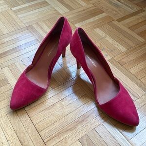 Pink suede pumps